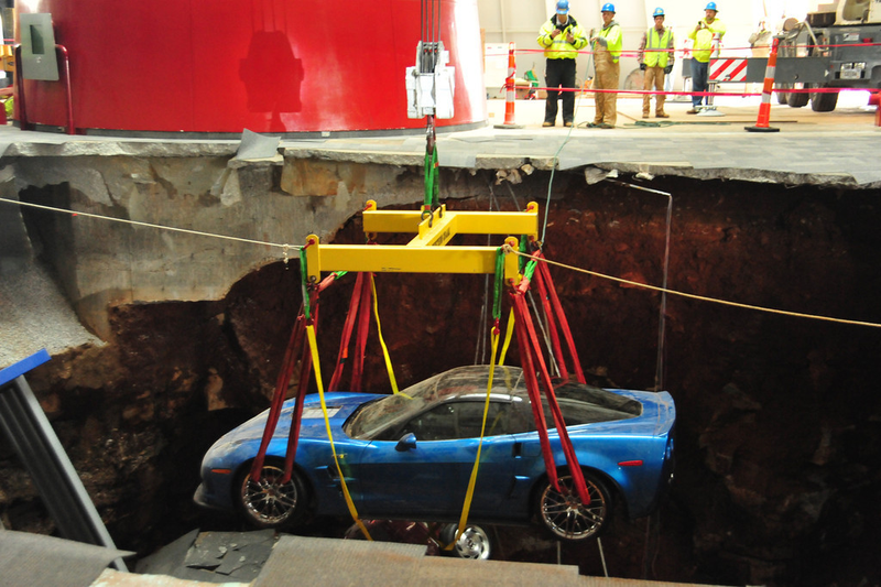 Illustration for article titled Check Out These Amazing Photos From The Corvette Sinkhole Recovery